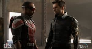 The Falcon and the Winter Soldier face off in their iconic costumes amid moody industrial decor, capturing the thrilling atmosphere of a Disney+ live-action adventure brought to life for fans.