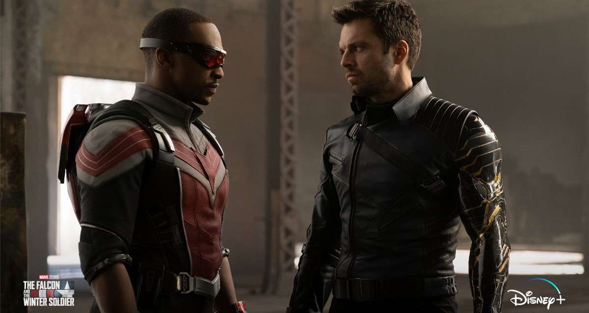 The Falcon and the Winter Soldier face off in their iconic costumes amid moody industrial decor, capturing the thrilling atmosphere of a Disney+ live-action adventure brought to life for fans.
