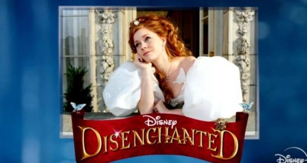 Giselle from Disney’s DisEnchanted, with her signature red hair and a flowing white dress, poses thoughtfully above the DisEnchanted logo, capturing the fairy-tale charm fans know from the magical worlds of Idina Menzel and James Marsden.
