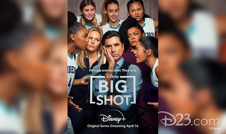 Coach Korn from Big Shot stands in the center of the basketball court, surrounded by his determined high school team, capturing the intense energy of a Disney Plus series moment perfect for fans of sports and Disney storytelling.
