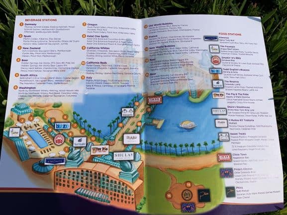 A vibrant festival map highlighting delicious food and beverage locations circling the picturesque lake at the Walt Disney World Swan and Dolphin, surrounded by iconic palm trees and resort buildings, capturing the lively spirit of the Spring Food & Wine Classic.