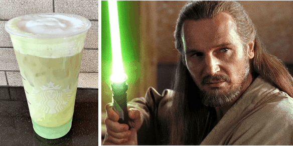A Jedi shows off their green lightsaber beside a vibrant green Starbucks drink, possibly the park-exclusive Jedi Iced Tea Latte, creating a perfect Star Wars photo op for fans.