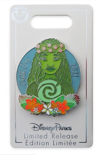 Celebrate Earth Day 2021 with this limited release Disney pin, showcasing a green character surrounded by vibrant flowers and plants. The packaging features exclusive artwork inspired by Disney Moana, making it a must-have collectible for fans visiting the parks or commemorating the special event.