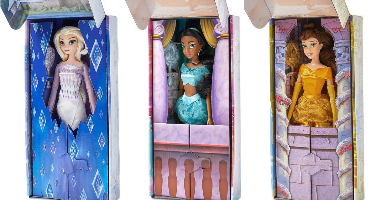 Elsa, Jasmine, and Belle collectible dolls are showcased in eye-catching boxes inspired by their classic Disney Parks appearances, perfect for fans seeking the magic of their favorite characters at home.