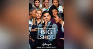 A coach in a suit gathers with his girls' basketball team, all dressed in their team jerseys and focused on him, echoing the vibe of Disney+'s Big Shot as if they're assembled for a post-game huddle at ESPN Wide World of Sports Complex.