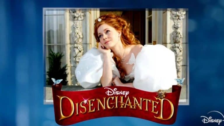 Giselle from Disney’s Disenchanted, dressed in white, strikes a whimsical pose above a vibrant red banner with the movie’s title, capturing the magical spirit Disney fans love.