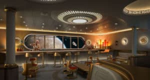 Explore the Star Wars Hyperspace Lounge-inspired space bar, where a robot bartender mixes cosmic cocktails beneath shimmering gold accents, and a vibrant planet glows through panoramic windows—a sci-fi atmosphere perfectly crafted for Disney Cruise Line fans and theme park enthusiasts seeking an immersive galactic adventure.