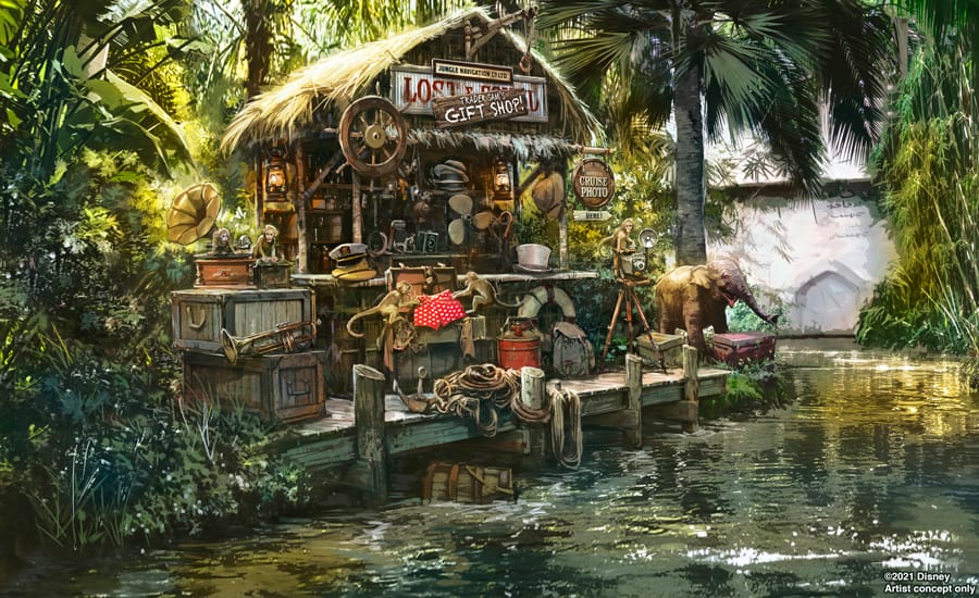Jungle Cruise-themed gift shop hut nestled beside the river, brimming with adventure souvenirs and crates, with an elephant from the iconic attraction peeking through the lush jungle backdrop.