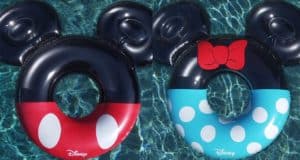 Mickey and Minnie Mouse-themed pool floats, adorned with classic bows and playful polka dots, drift across sparkling blue water—bringing a splash of Disney magic to your summer adventures, just like relaxing at a Disney resort pool.