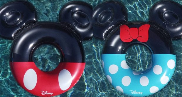 Mickey and Minnie Mouse-themed pool floats, adorned with classic bows and playful polka dots, drift across sparkling blue water—bringing a splash of Disney magic to your summer adventures, just like relaxing at a Disney resort pool.