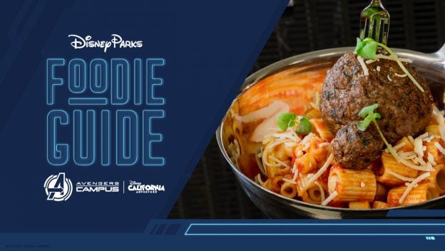 The Disney Parks Foodie Guide graphic invites fans to check out a tempting bowl of pasta topped with juicy meatballs and melted cheese—one of the eye-catching dishes served at Avengers Campus in Disneyland, perfect for food-loving visitors eager to explore superhero-inspired eats.