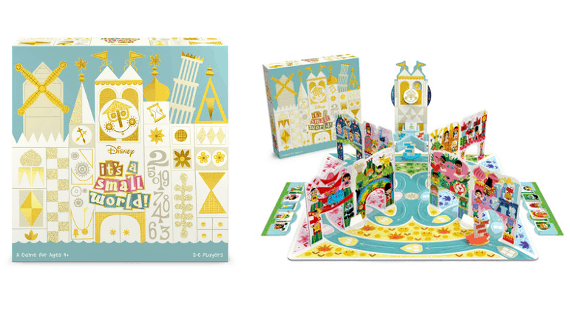 Disney "It's a Small World" board game, inspired by the timeless Disneyland attraction, with the game box and vibrant illustrated pieces displayed beside a whimsical clock tower—bringing theme park magic to family game night for Disney fans of all ages.