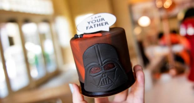 Get ready for Star Wars Day at Disney Springs with the exclusive I Am Your Father Petit Cake! The treat, held up to showcase its clever “I am your father” sign, is a must-try for fans and available only for a limited time at Disney’s shopping and dining district.
