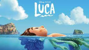 Luca from Pixar floats in the sea below the "Luca" movie title, with a picturesque Italian coast and blue sky behind him, teasing fans about an exciting future Luca adventure that could inspire new attractions or experiences at Disney Parks.