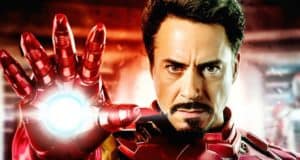 Iron Man, channeling Robert Downey Jr.’s signature Marvel charisma, raises his glowing hand and strikes an intense pose for fans.