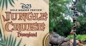 D23 Gold Members gather by the Jungle Cruise preview sign at Disneyland, watching as guests scramble up a pole to evade a rhino in the iconic, adventure-filled jungle scene.