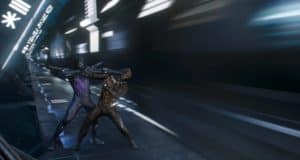 Guests witness two armored heroes battling at lightning speed inside a glowing, futuristic train tunnel, with vibrant lights streaking past—a heart-pounding spectacle reminiscent of scenes from Wakanda found in Black Panther attractions at Disney Parks.