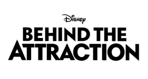 Disney+ logo showcased above bold "Behind the Attraction" lettering, set against a white backdrop that evokes the look of Disney Parks documentary promotions.