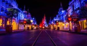 Main Street, U.S.A. dazzles under vibrant nighttime lights, with Cinderella Castle aglow in the distance during October’s sold-out Disney After Hours Boo Bash. The street is empty, radiating magic and excitement for this exclusive event.