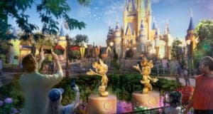 Guests snap photos of the Disney Fab 50 golden character statues, including Daisy Duck, displayed in front of Cinderella Castle at Walt Disney World, surrounded by vibrant park scenery.