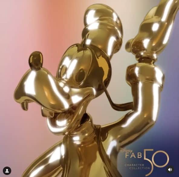 Pluto's gleaming gold statue, sporting his signature hat, shines as part of the Disney Fab 50 Character Collection. The corner features the collection's logo, honoring Walt Disney World's magic and iconic characters like Daisy Duck.