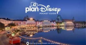 Disney’s BoardWalk Inn and Villas illuminated at night, with colorful resort lights shimmering across Crescent Lake; "planDisney Pocket Guide" featured on the image—a magical Disney World nightlife view.