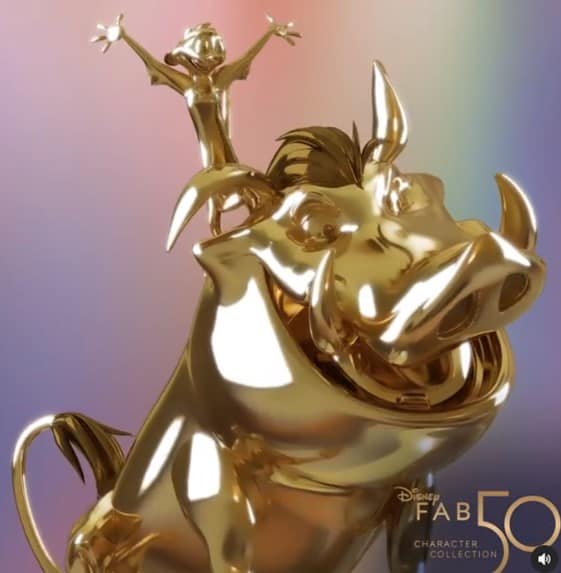 Timon gleams atop a golden Pumbaa statue from Disney’s Fab 50 Character Collection, shining brightly like the iconic sculptures guests discover throughout Walt Disney World, set against a pastel backdrop.