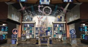 Step into a vibrant Disney World shop decked out with sparkling blue merchandise, a whimsical castle mural, and a glowing Mickey-shaped light fixture overhead. Eye-catching displays showcase exclusive Disney World 50th Anniversary items perfect for fans and collectors.