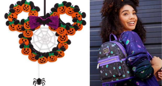 Halloween Mickey pumpkin wreath with a spider accent stands out as a festive decoration, while a guest beams nearby wearing a stylish purple and black backpack—ideal for Disney park fans eager to show off their love for Halloween merchandise from shopDisney.