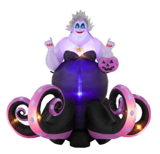 Ursula from The Little Mermaid dazzles in this inflatable Halloween display at the park, featuring her iconic purple tentacles and holding a pink pumpkin bucket, all glowing from within—an enchanting addition to make your Halloween celebration at our entertainment destination truly unforgettable.
