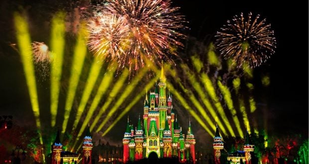 Cinderella Castle shines with golden beams as fireworks light up the night sky, setting the stage for Disney Very Merriest After Hours—a festive, can’t-miss celebration ideal for selecting your next magical party date at Magic Kingdom.