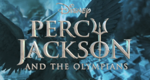 The Percy Jackson and the Olympians title logo, featuring bold wings and a misty, blue-toned backdrop, sets an immersive scene reminiscent of Disney park attractions that transport guests into legendary worlds. The atmospheric design channels the excitement of mythology fans eager to experience Olympus brought to life in true Disney style.