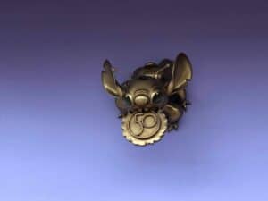 A playful bronze Toy Story alien sculpture clutching a shimmering "50" medallion pops against a purple backdrop, marking the magical celebration of Walt Disney World’s 50th Anniversary.