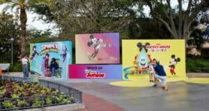 Three vibrant Disney Junior backdrops featuring Spidey and Mickey Mouse bring the excitement of Disney Springs to life, creating perfect photo ops for fans exploring the entertainment district.