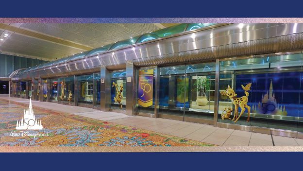 Orlando International Airport’s terminal transforms into a celebration of Walt Disney World’s 50th Anniversary, with sparkling banners and playful Bambi figures along the glass walls, immersing guests in Disney magic from the moment they arrive.