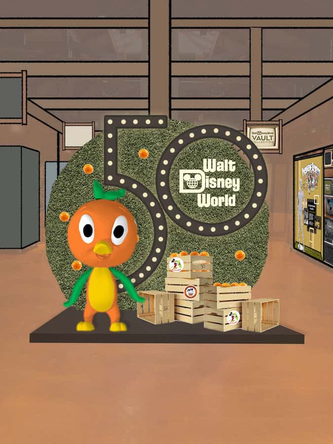 The adorable Orange Bird greets guests beside the "50 Walt Disney World" display, surrounded by crates and fresh oranges in a vibrant Vault Collection-themed space—offering fans a memorable shopping destination within the parks.