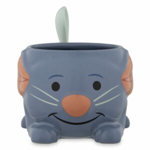 Remy-themed blue ceramic mug from Remy’s Ratatouille Adventure at EPCOT, featuring a smiling mouse design with chef hat and a playful spoon tail that adds interactive fun for Disney fans.