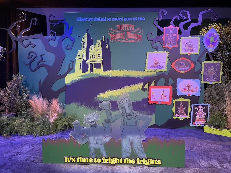 Muppets Haunted Mansion display featuring favorite Muppet characters as playful ghosts, a spooky mansion backdrop, and framed portraits, all inspired by the hit Disney+ special and showcased at Disney's Hollywood Studios.