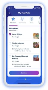 Disney Genie app displayed on a smartphone, showcasing top attraction selections like Astro Orbiter and highlighting new features introduced since the service launched at Walt Disney World on October 19th.