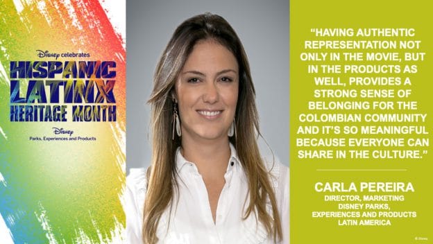 Carla Pereira beams next to vibrant signage honoring Hispanic Heritage Month and celebrating the contributions of the Colombian community, capturing the festive spirit of the park’s cultural event.