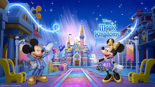 Mickey and Minnie Mouse greet guests in front of a vibrant castle, with the "Disney Magic Kingdoms" logo shining above them. They're ready to kick off an unforgettable celebration, offering magical gifts as part of the 50th Anniversary festivities at the park.