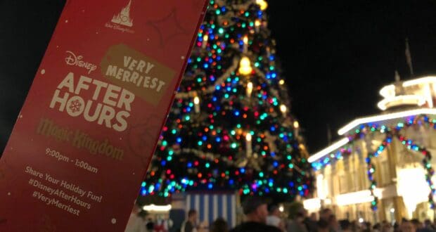 A Disney Very Merriest After Hours ticket is showcased in front of the sparkling Magic Kingdom Christmas tree at night.