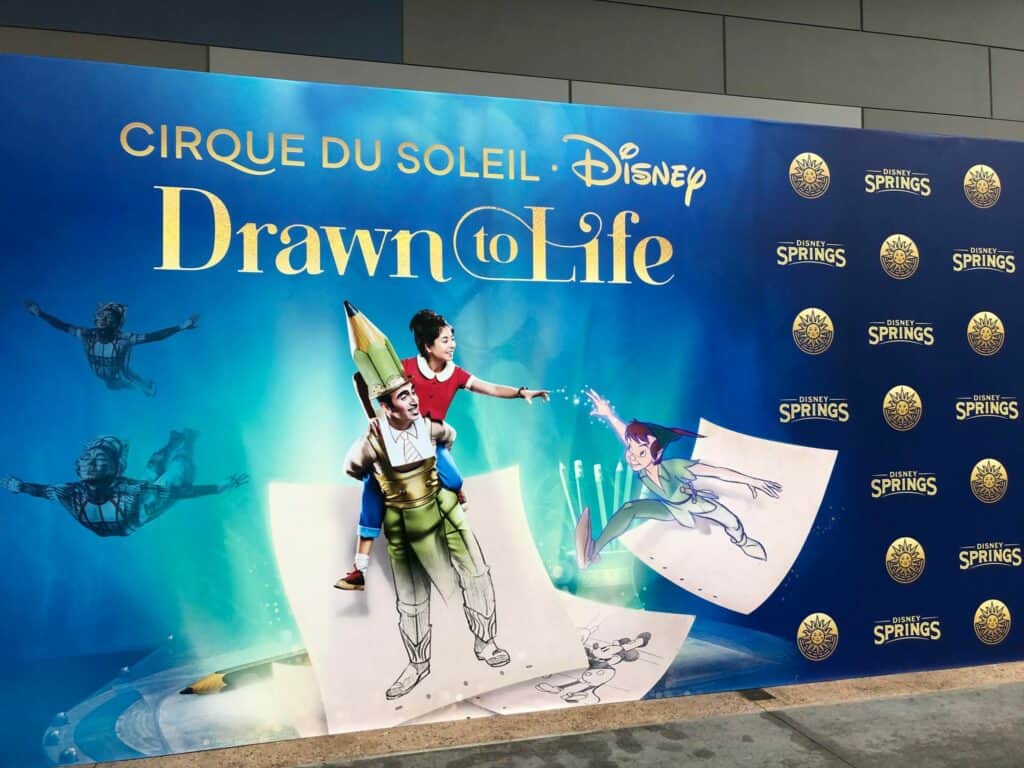 Cirque du Soleil’s Drawn to Life poster, bursting with animated Disney characters and iconic Disney Springs branding, sets the stage for an electrifying Opening Night celebration that theme park fans won’t want to miss.