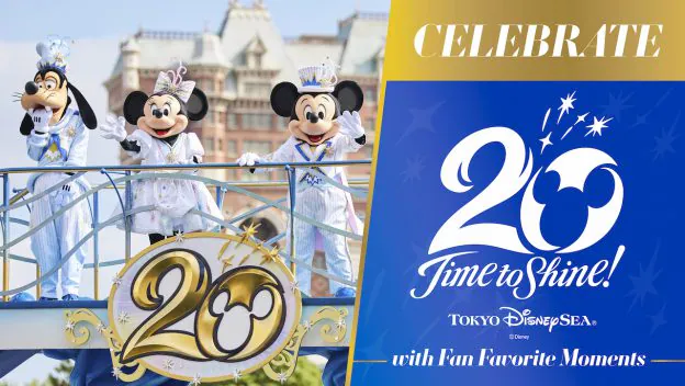 Mickey, Minnie, and Goofy join the festivities at Tokyo DisneySea’s 20th Anniversary, gathered in front of a dazzling “Time to Shine!” sign sparkling with celebratory energy.