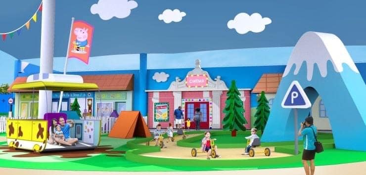 Kids explore Peppa Pig Theme Park’s vibrant playground, enjoying whimsical playhouses, lush trees, fun rides, and a signature mountain structure—all set within a Certified Autism Center designed for an inclusive guest experience.