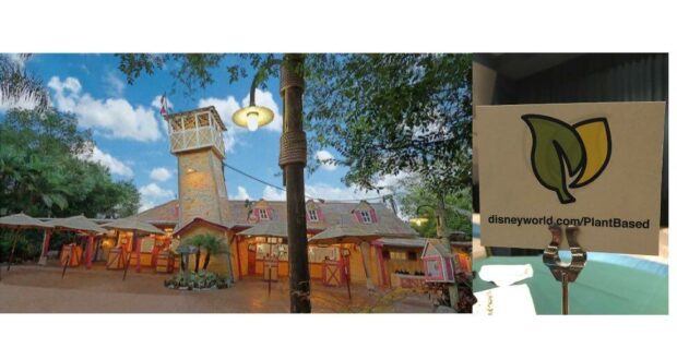 Enjoy the relaxed outdoor dining atmosphere at Disney’s Typhoon Lagoon, where a charming wooden building welcomes guests with a prominent sign—a green leaf icon and "disneyworld.com/PlantBased"—inviting you to discover the park’s delicious plant-based menu options.