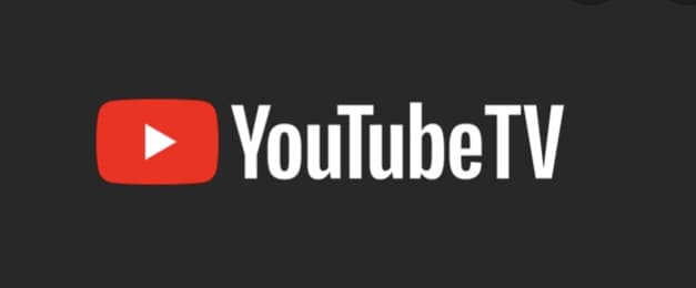 YouTube TV logo featuring a bold red play button beside bright white "YouTubeTV" lettering, resembling the vibrant signage you’d spot at an entertainment park entrance, all set against a sleek black backdrop.