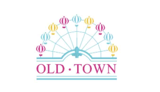 Vibrant ferris wheel and glowing lanterns above bold pink "OLD TOWN" lettering, evoking the lively atmosphere of Old Town’s New Year’s Eve festivities, with a touch of Disney World-style celebration and wonder.