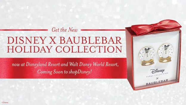 Step into the magic of the Disney x BaubleBar Holiday Collection—sparkling holiday earrings shine in a festive red box topped with a bow. This limited-edition Disney Parks keepsake adds extra glimmer to your trips through Disneyland or Walt Disney World, perfect for fans looking to celebrate the season in style.