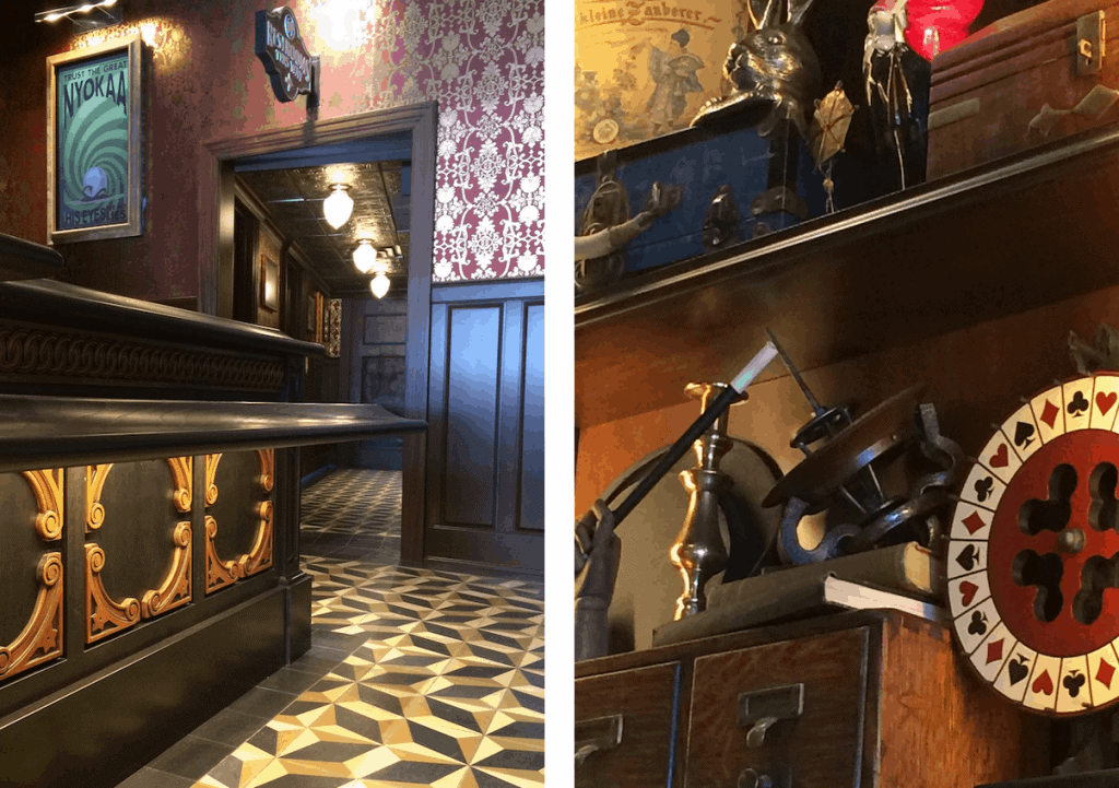 A whimsical Victorian-inspired lounge adorned with intricate woodwork, patterned flooring, vintage artifacts, and shelves brimming with unique Disney trinkets—blending the enchanting ambiance of a Disney resort bar with the nostalgic allure of BoardWalk charm.